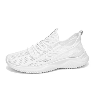Chaussures de course blanches en maille pour femme avec semelles souples