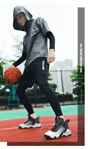 Athletic man wearing stylish high-top basketball shoes dribbling a ball on a court