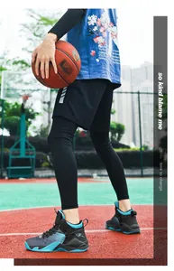 Detailed view of blue and black high-top basketball shoes worn on a professional court