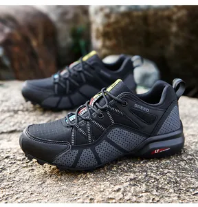 Side view of black men's outdoor hiking shoes featuring breathable mesh and textured sole