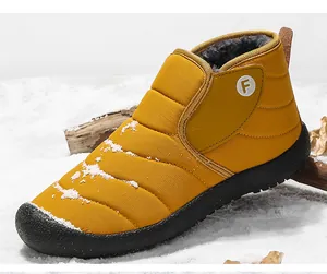 Yellow winter snow boots with warm fur lining and non-slip rubber sole for outdoor use