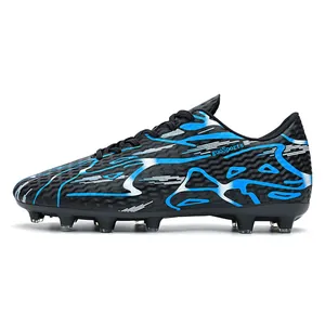 Professional blue and black low-top soccer cleats for artificial grass training sessions