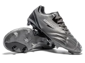 Detailed macro shot of silver metallic soccer cleats with durable professional studs