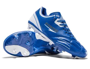 Detailed macro view of professional blue soccer cleats showing the durable studded sole