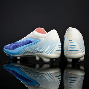 Professional low-top soccer shoes with breathable mesh and firm ground spikes