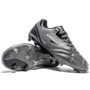 Grey professional soccer cleats with long studs for breathable youth athletic comfort
