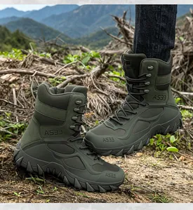 Close-up detail of durable olive green tactical boots for outdoor hiking and training.