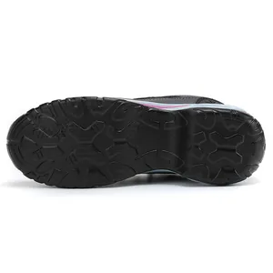 Close-up of the durable rubber outsole on women's outdoor trekking shoes with deep treads
