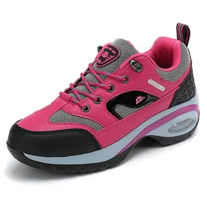 Pink and black women's outdoor hiking shoes with breathable mesh and air cushion sole.