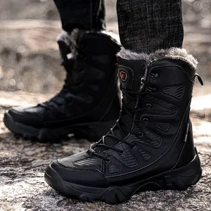 Rugged men's black high-top winter snow boots featuring warm faux fur lining and anti-slip sole