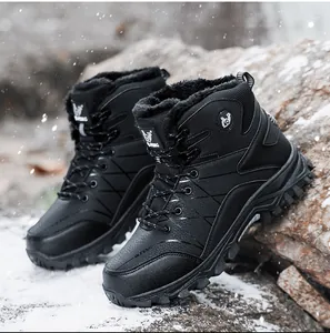 Close-up of black men's high-top winter hiking boots with warm fur lining.