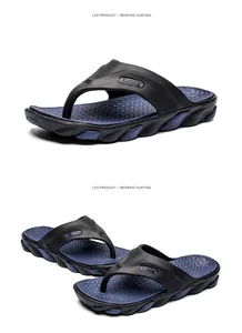 Detailed macro view of men's summer flip-flops with ergonomic anti-slip massage sole