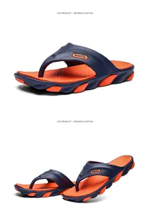Detail view of stylish navy blue and orange men's flip-flops with Soonfly brand