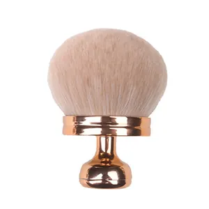 Large mushroom head makeup brush with soft bristles and rose gold handle