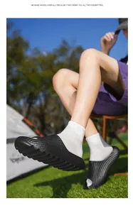 Detailed close-up view of black breathable mesh texture foam slides for outdoor camping