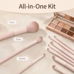 Close-up detail of premium 13-piece pink makeup brush set for face and eyes application.