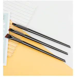Detail view showing three professional angled eyeliner and synthetic hair aegyo-sal brushes