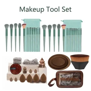 20-piece makeup tool set with green brushes, brown sponges, and wash bag