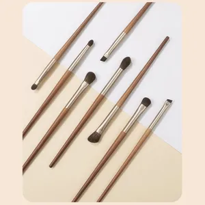 Professional 8pcs eye makeup brush set with wooden handles and soft synthetic bristles.
