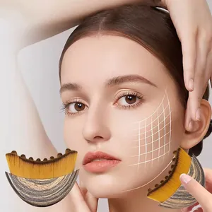 Detail showing the lymphatic contour face brush applying makeup on the jawline