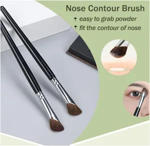 Close-up macro detail of sickle-shaped nose contour brush head showing powder application on skin