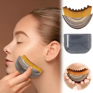 Detailed view of the Lymphatic Contour Face Brush with storage case and usage demonstration