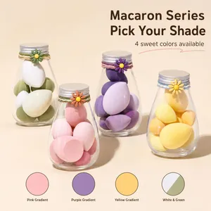 Four macaron-colored makeup sponges sets in decorative milk bottles, detailed view