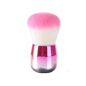 Vista detallada de la brocha de maquillaje degradada rosa con cerdas ultra suaves