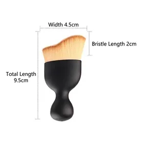 Close-up detail of wave-shaped contour brush with 9.5cm total length and soft bristles