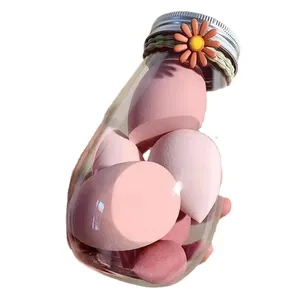 Travel size pink makeup sponge set in cute milk bottle packaging for dry and wet cosmetic use