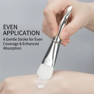 Double-ended facial mask brush with soft bristles and integrated metal spatula handle