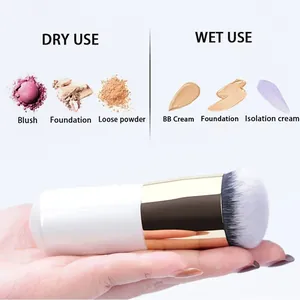 Detail view of the portable chubby makeup brush showing dry and wet use makeup swatches.