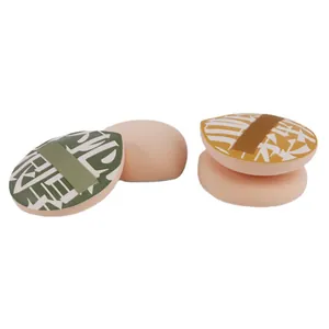 Set of marshmallow cushion makeup puffs for smooth foundation application in green and yellow