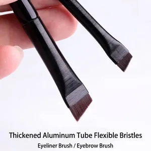 Close-up of professional angled eyeliner and eyebrow brushes with synthetic bristles