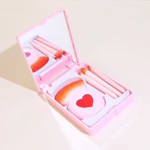 Portable 4-piece pink makeup brush set featuring a heart design and built-in mirror case