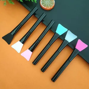 Set of 6 silicone face mask brushes with black handles for DIY skincare and beauty