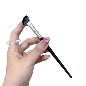 Professional slanted fan-shaped nose contour brush for precise makeup and highlighting