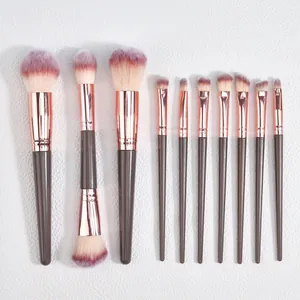 Set professionale di 11 pennelli trucco oro champagne con setole sintetiche viola