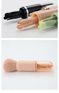 Close-up view of a 4-in-1 telescopic makeup brush set showing the portable design and brushes