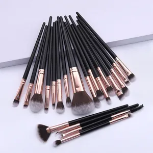 Vue détaillée d'un kit professionnel de 20 pinceaux de maquillage avec embouts or rose