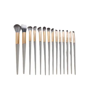 Ensemble professionnel de 14 pinceaux de maquillage avec embouts dorés et manches gris
