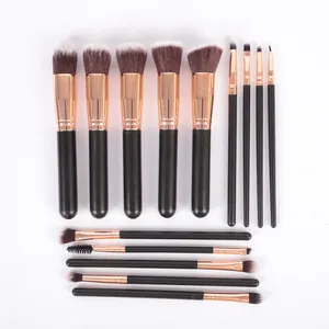 Kit professionnel de 14 pinceaux de maquillage avec ferrules or rose et manches noirs.