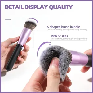 Pennello da trucco viola professionale con setole morbide e manico ergonomico a forma di S.
