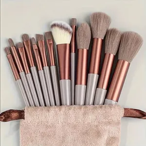 Set di 13 pennelli da trucco professionali con setole morbide e custodia in peluche