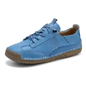 Comfortable light blue leather casual sneakers with durable brown rubber sole for men and women