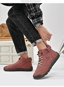 Detailansicht der Herren-Freizeitstiefel aus rotbraunem Leder mit handgefertigten Nähten