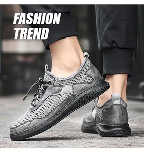 Vue détaillée des chaussures de randonnée en maille grise avec semelle noire texturée