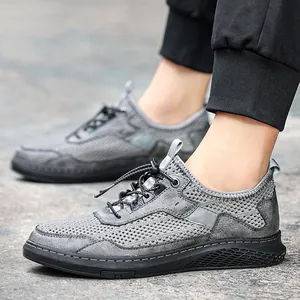 Chaussures de randonnée décontractées en mesh gris pour hommes avec semelle noire