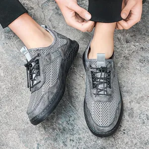 Chaussures de randonnée en maille grise respirante pour hommes avec système de laçage rapide
