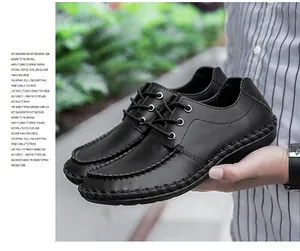 Zapatos casuales de cuero negro para hombre con cordones y punta redonda.